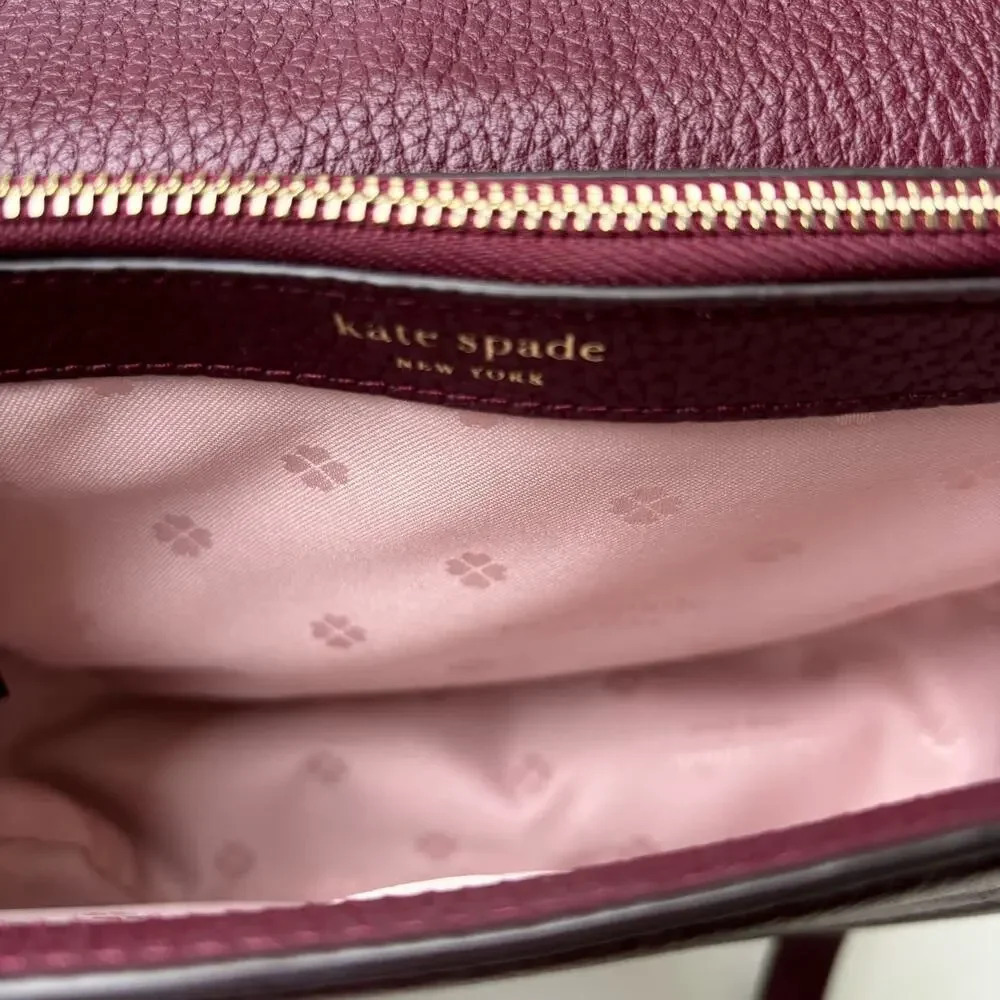 Kate Spade New York Classic Knott Pebbled Leather Medium Saddle Bag in Grenache - Picture 13 of 14